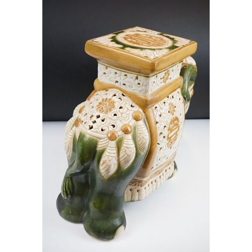 121 - Ceramic elephant jardinere stand / stool in the form of a Chinese elephant with green and yellow gla... 