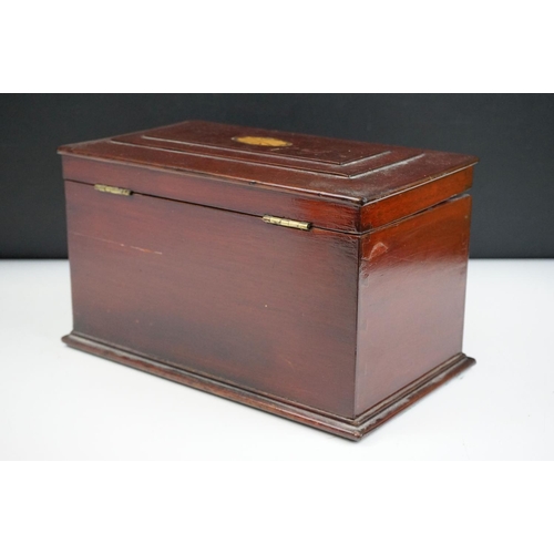 122 - Tea caddy having a hinged lid with inlaid walnut panel opening to reveal tea bowl to the centre flan... 