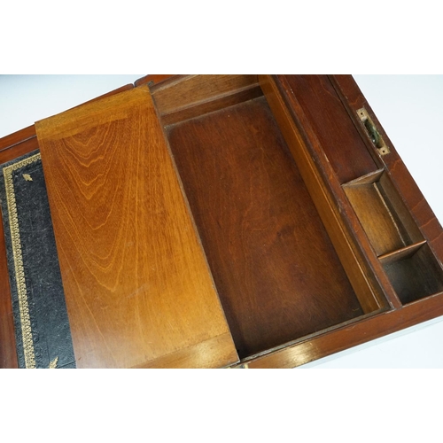 123 - 19th Century Victorian mahogany writing slope having brass banded detailing and a tooled blue leathe... 