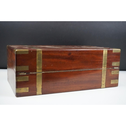 123 - 19th Century Victorian mahogany writing slope having brass banded detailing and a tooled blue leathe... 