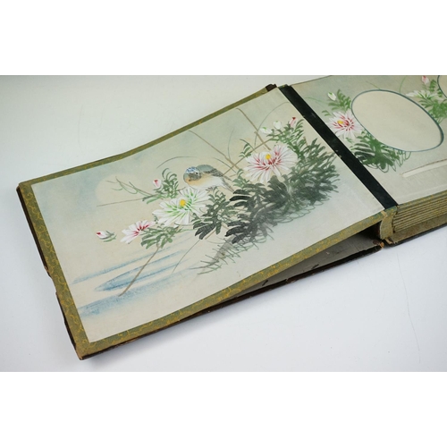 124 - Early 20th Century Japanese lacquer photograph / postcard album having applied mother of pearl figur... 