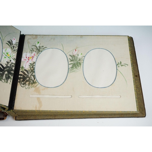 124 - Early 20th Century Japanese lacquer photograph / postcard album having applied mother of pearl figur... 