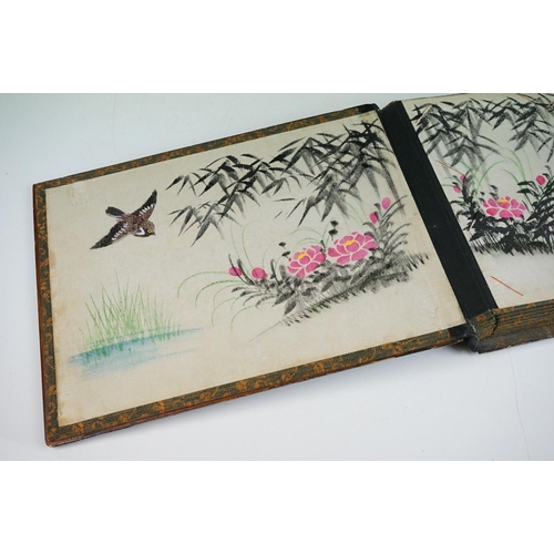 125 - Early 20th Century Japanese lacquer photograph / postcard album featuring a gilt landscape scene to ... 