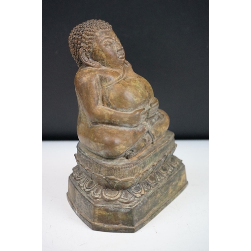 139 - Thai ' Fat Bellied ' Bronze Buddha seated in the lotus position. Measures 20cm high