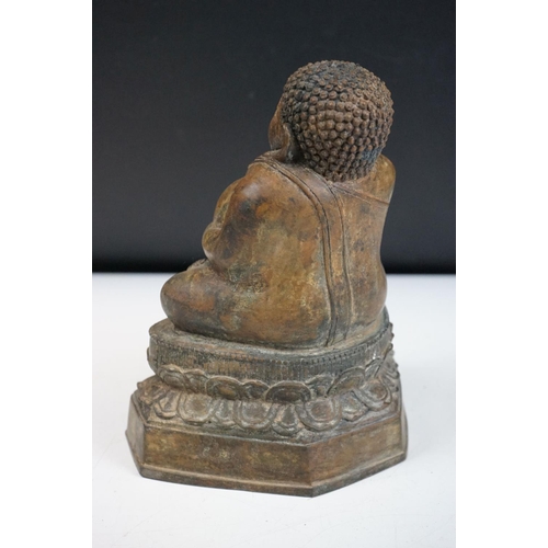 139 - Thai ' Fat Bellied ' Bronze Buddha seated in the lotus position. Measures 20cm high