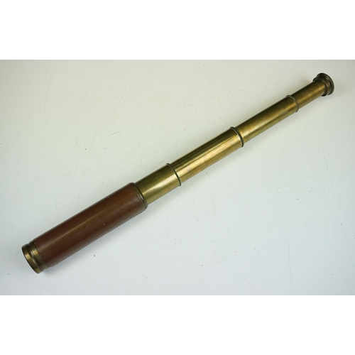 141 - An antique Franks Glass Company brass four drawer telescope.