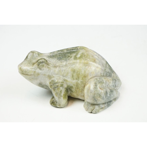 142 - A Canadian Inuit / Eskimo art carved soapstone ornamental seal together with a frog.