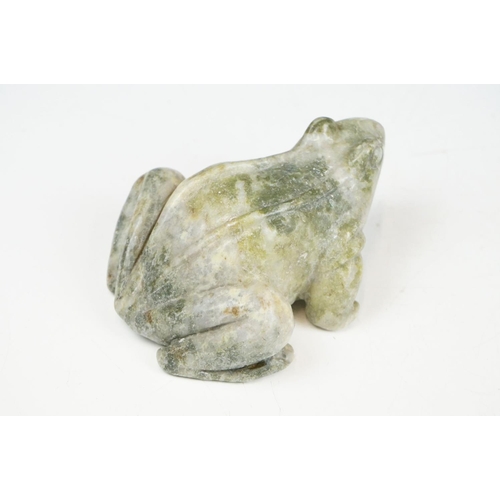 142 - A Canadian Inuit / Eskimo art carved soapstone ornamental seal together with a frog.