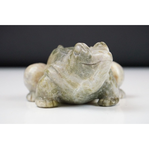 142 - A Canadian Inuit / Eskimo art carved soapstone ornamental seal together with a frog.