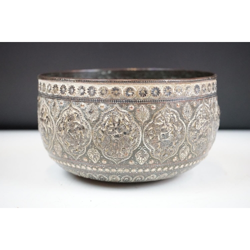 148 - An antique asian copper bowl with silvered relief decoration together with a brass example.