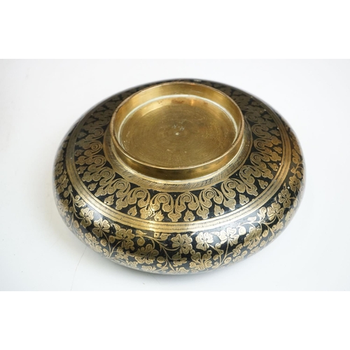 148 - An antique asian copper bowl with silvered relief decoration together with a brass example.