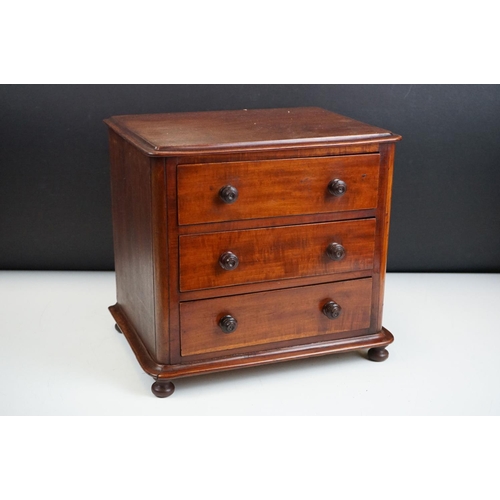 151 - Victorian mahogany table top three drawer chest