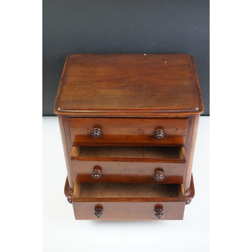 151 - Victorian mahogany table top three drawer chest