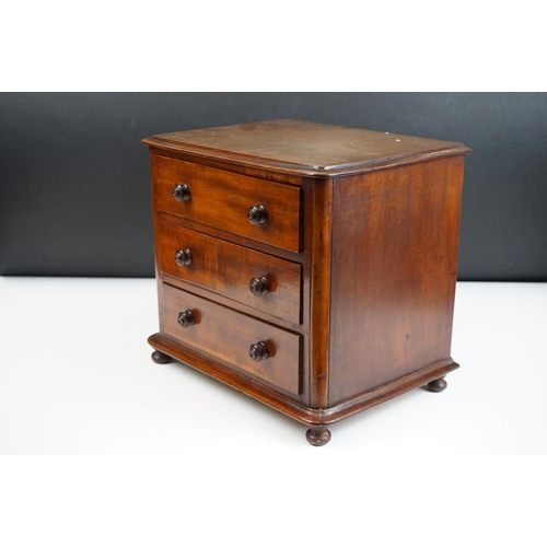 151 - Victorian mahogany table top three drawer chest