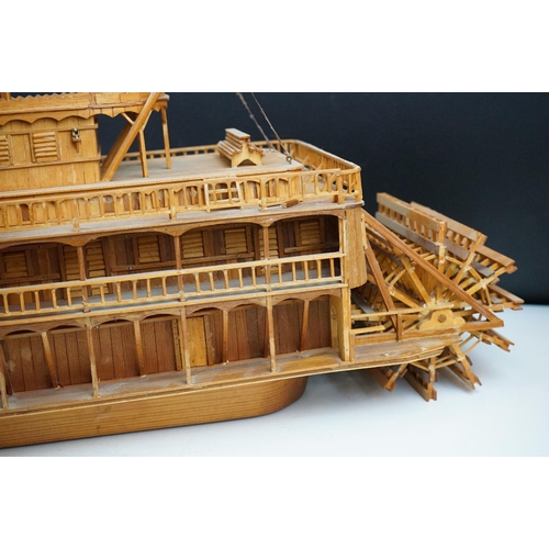 155 - A kit built wooden model of the Showboat paddle steamer, measures approx 80cm in length.