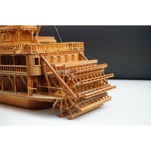 155 - A kit built wooden model of the Showboat paddle steamer, measures approx 80cm in length.