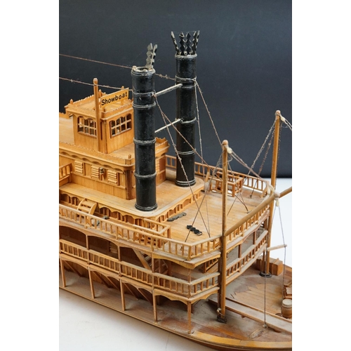 155 - A kit built wooden model of the Showboat paddle steamer, measures approx 80cm in length.