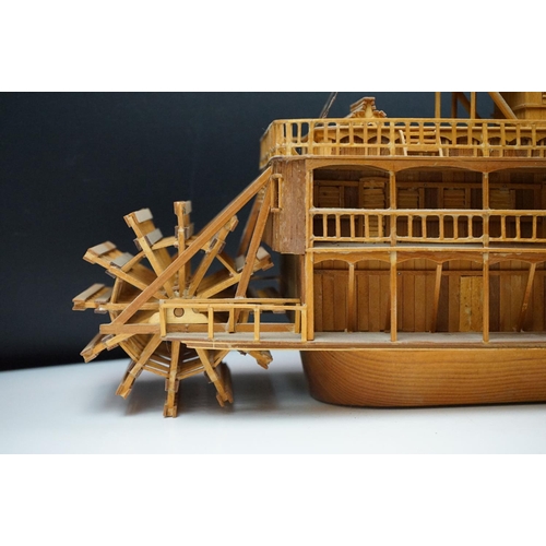 155 - A kit built wooden model of the Showboat paddle steamer, measures approx 80cm in length.