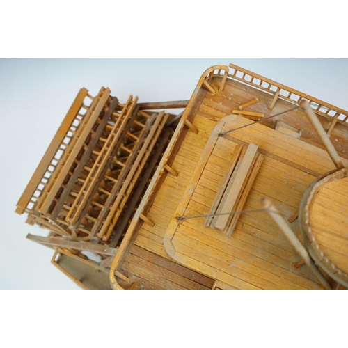 155 - A kit built wooden model of the Showboat paddle steamer, measures approx 80cm in length.