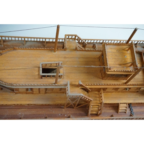 155 - A kit built wooden model of the Showboat paddle steamer, measures approx 80cm in length.