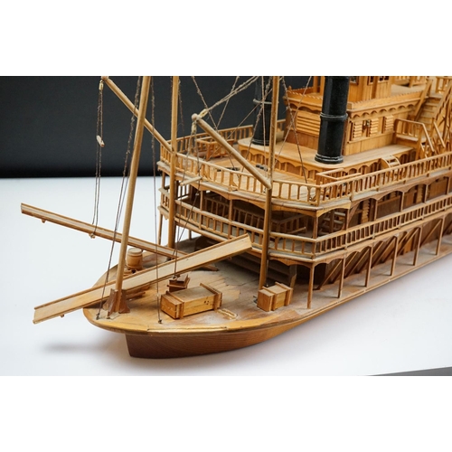 155 - A kit built wooden model of the Showboat paddle steamer, measures approx 80cm in length.