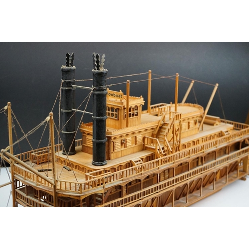 155 - A kit built wooden model of the Showboat paddle steamer, measures approx 80cm in length.