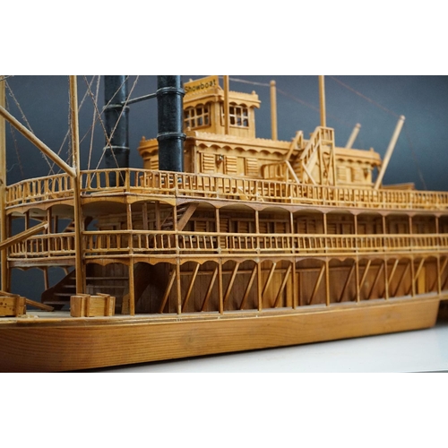 155 - A kit built wooden model of the Showboat paddle steamer, measures approx 80cm in length.