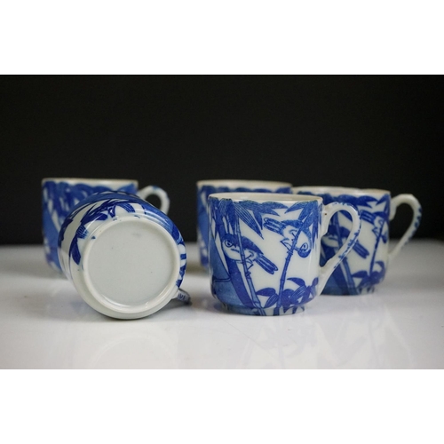 90 - 20th Century Japanese tea set having printed decoration to the sides including tea pot and six cups,... 