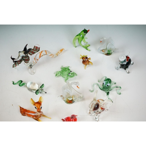 92 - Assorted 20th Century glassware to include Murano animals and an assortment of glass paperweights (a... 