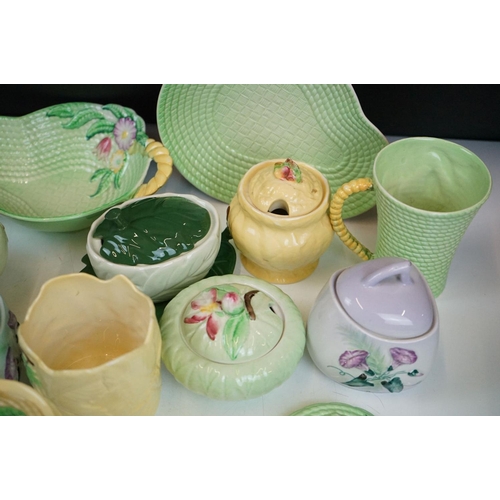 95 - Carlton Ware - Collection of Art Deco ceramics to include lidded sugar bowls, four mugs, side plate ... 