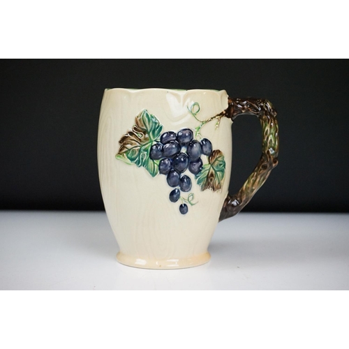 97 - Carlton Ware - 1930's Grape pattern ceramics to include three jugs, Hors d'oeuvre platters, mugs, to... 