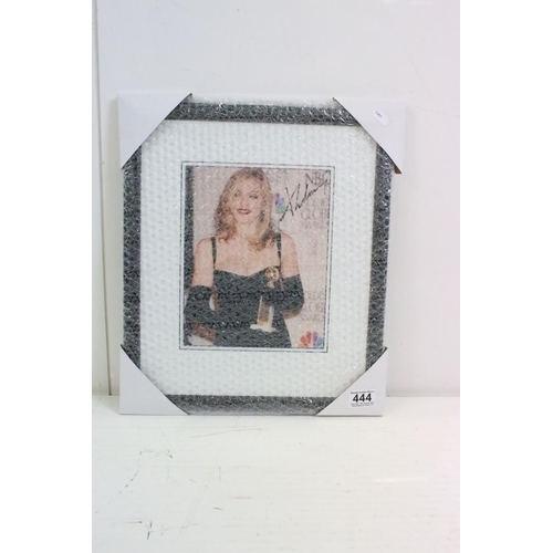 444 - Madonna autograph - a signed photograph of Madonna at the Golden Globe awards with certificate of au... 