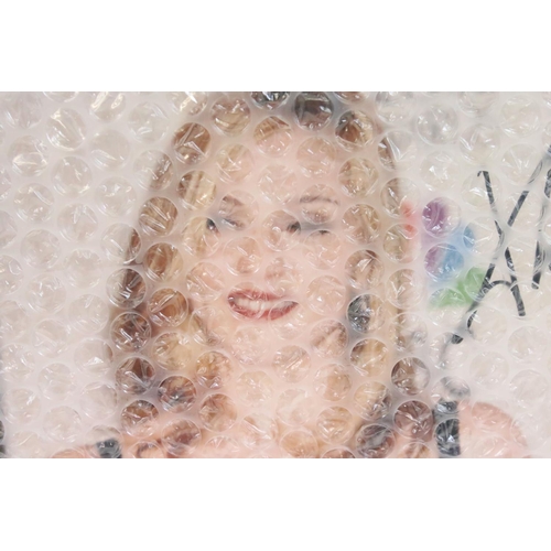 444 - Madonna autograph - a signed photograph of Madonna at the Golden Globe awards with certificate of au... 