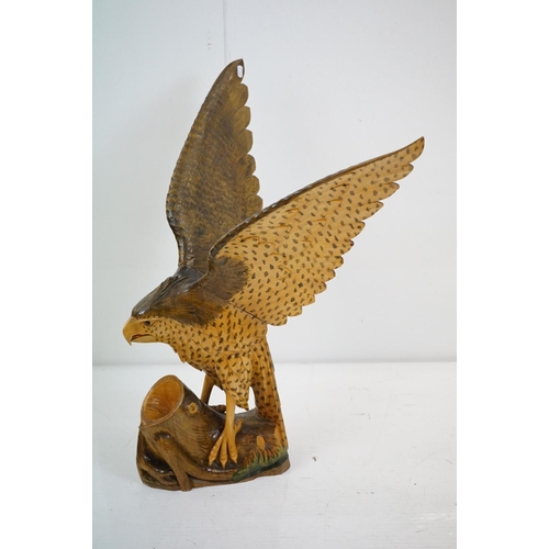 170 - Carved wooden eagle statue carved with out stretched wings with painted detailing raised on a wooden... 