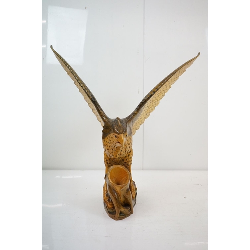 170 - Carved wooden eagle statue carved with out stretched wings with painted detailing raised on a wooden... 