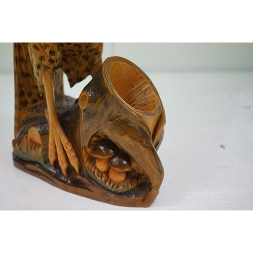 170 - Carved wooden eagle statue carved with out stretched wings with painted detailing raised on a wooden... 