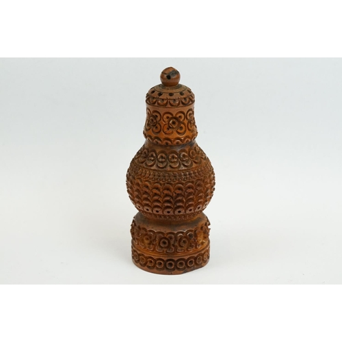 176 - 19th century Carved Coquilla Nut Pepper Pot, 11cm high