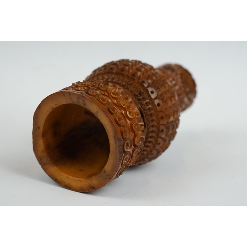 176 - 19th century Carved Coquilla Nut Pepper Pot, 11cm high