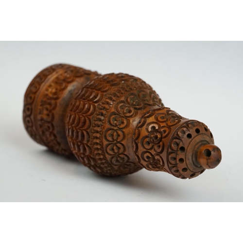 176 - 19th century Carved Coquilla Nut Pepper Pot, 11cm high