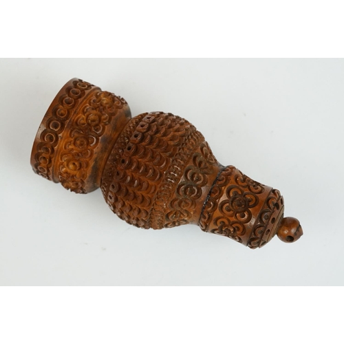 176 - 19th century Carved Coquilla Nut Pepper Pot, 11cm high