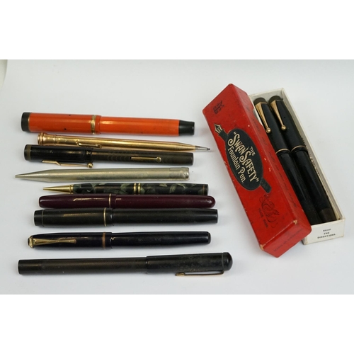 181 - A collection of ballpoint and fountain pens to include Parker and Waterman examples.