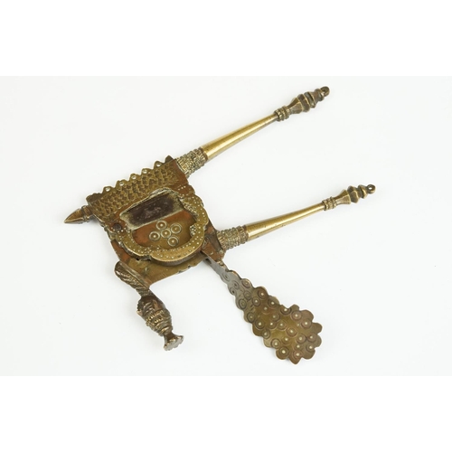 183 - South East Asian Betel Nut Cutters with figural decoration, 15cm long