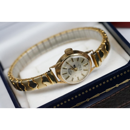 188 - A small collection of ladies and gents wristwatches to include a 9ct gold cased example.