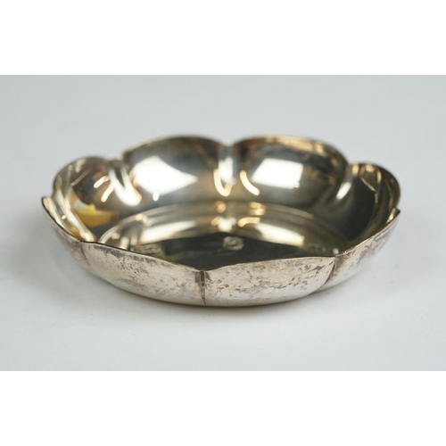 205 - Pair of silver ashtrays