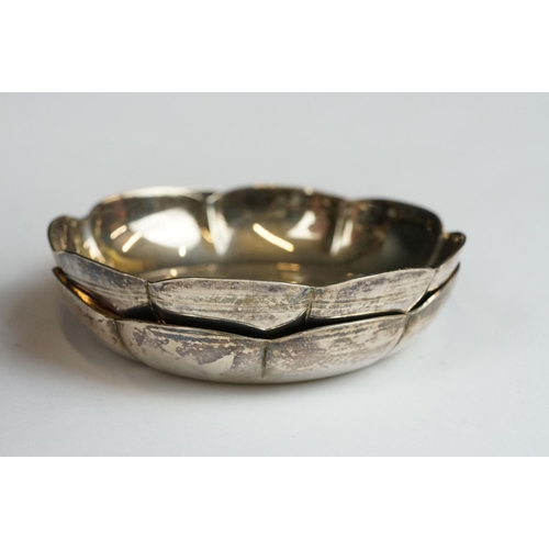 205 - Pair of silver ashtrays