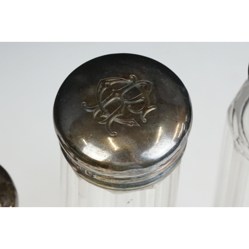 206 - A collection of six glass vanity jars with hallmarked silver tops together with a quantity of mixed ... 