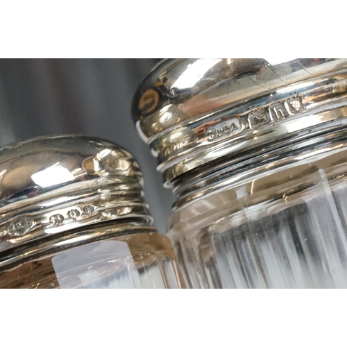 206 - A collection of six glass vanity jars with hallmarked silver tops together with a quantity of mixed ... 