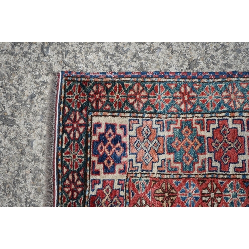 598 - Eastern Red and Blue Ground Wool Rug decorated with six guls within a deep border, approx. 151cm x 1... 