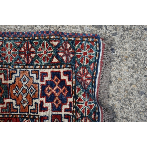 598 - Eastern Red and Blue Ground Wool Rug decorated with six guls within a deep border, approx. 151cm x 1... 