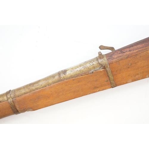 114 - An antique Rampart gun, measures approx 229cm in length.